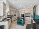 Spacious kitchen with large island, granite countertops, and custom cabinets at 6161 Blakeford Dr, Windermere, FL 34786