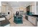 Well-designed kitchen featuring a large island, custom cabinetry, and modern appliances at 6161 Blakeford Dr, Windermere, FL 34786