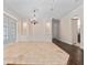 Open living space with elegant tile flooring, built-in features, and recessed lighting at 6161 Blakeford Dr, Windermere, FL 34786