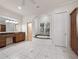 Luxurious primary bathroom featuring a soaking tub, walk-in shower, dual vanities, and ample storage space at 6161 Blakeford Dr, Windermere, FL 34786