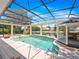 Enclosed pool and gazebo with outdoor kitchen, creating a perfect backyard oasis for entertaining and relaxation at 6161 Blakeford Dr, Windermere, FL 34786