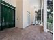 Charming front porch with brick flooring and decorative columns, perfect for relaxing at 6161 Blakeford Dr, Windermere, FL 34786