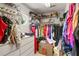 Organized walk-in closet with shelving and storage, perfect for maximizing space at 6205 Miramonte Dr # 103, Orlando, FL 32835
