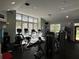 Bright community gym offering treadmills, stationary bikes, and weight machines for resident fitness at 6304 Raleigh St # 204, Orlando, FL 32835