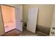 Basement area with access to unfinished utility room at 714 Herbert St, Port Orange, FL 32129