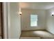 Bright bedroom features natural light and neutral walls at 714 Herbert St, Port Orange, FL 32129