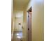 Hallway view featuring neutral paint and door frames at 714 Herbert St, Port Orange, FL 32129