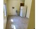 Neutral kitchen featuring a refrigerator and open floorplan at 714 Herbert St, Port Orange, FL 32129