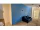 Cozy living room features modern accent wall and comfortable seating at 714 Herbert St, Port Orange, FL 32129