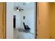 Office featuring a ceiling fan and skylight in need of flooring at 714 Herbert St, Port Orange, FL 32129
