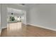 Open living area with light-filled sunroom visible from a broad entry at 7900 Saint Giles Pl, Orlando, FL 32835