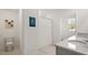 Bathroom featuring white walls, tile flooring, a shower with a white curtain, and a granite countertop vanity at 850 Lazio Cir, Debary, FL 32713
