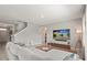 Comfortable living room with a plush sectional sofa and a wall-mounted television at 850 Lazio Cir, Debary, FL 32713