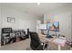 Spacious home office with an L-shaped desk, dual monitors, and organized storage, ideal for productivity at 850 Lazio Cir, Debary, FL 32713