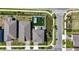 Birds eye view highlighting the landscaped backyard with a pool, home design, and street layout within the community at 9027 Coral Cape St, Kissimmee, FL 34747