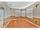 Cozy dining area with hardwood floors and view of the sliding door to the patio at 935 Northern Dancer Way # 107, Casselberry, FL 32707