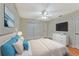 Bright main bedroom featuring ample closet space and a calming color palette at 935 Northern Dancer Way # 107, Casselberry, FL 32707