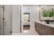 Modern bathroom with glass-enclosed shower, and marble countertops at 944 Club Cresswind Dr, Lady Lake, FL 32159