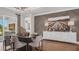Elegant dining room featuring a stylish table and chairs with elegant decor and modern artwork at 944 Club Cresswind Dr, Lady Lake, FL 32159