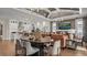 Open-concept living space features a modern kitchen, dining area, and a comfortable living room at 944 Club Cresswind Dr, Lady Lake, FL 32159