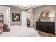 Serene main bedroom showcases a stylish dresser and ensuite bathroom at 944 Club Cresswind Dr, Lady Lake, FL 32159