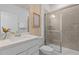 This bathroom features a glass-enclosed shower, single sink vanity, and modern fixtures at 10148 Hadley St, Orlando, FL 32829