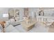 Open-concept living and dining area with modern furniture, stylish decor, and views into the kitchen at 10148 Hadley St, Orlando, FL 32829