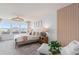 Inviting main bedroom featuring a comfortable bed, bright windows, and elegant decor at 10148 Hadley St, Orlando, FL 32829
