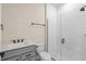 Modern bathroom featuring a glass-enclosed shower and a vanity with sleek hardware at 10245 Park Estates Ave, Orlando, FL 32836
