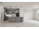 Kitchen featuring modern appliances, center island, and bright recessed lighting at 10245 Park Estates Ave, Orlando, FL 32836