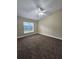 Bedroom with ceiling fan and window at 1025 Clovercrest Rd, Orlando, FL 32811