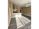 Bright living area with wood-look floors, a breakfast bar, and natural light from the windows at 1025 Clovercrest Rd, Orlando, FL 32811