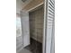 Spacious closet with shelving for storage, easily accessible for kitchen or household items at 1025 Clovercrest Rd, Orlando, FL 32811