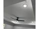 The black ceiling fan is newly installed with LED lights and has a tray ceiling at 10641 Sw 110Th Ct, Dunnellon, FL 34432