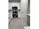Modern kitchen with stainless steel appliances, white cabinets, and contemporary hardware at 10641 Sw 110Th Ct, Dunnellon, FL 34432