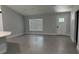 Open floor plan with an entryway and lots of natural light streaming through modern shades at 10641 Sw 110Th Ct, Dunnellon, FL 34432