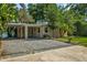 A charming single-story home with a covered carport and well-maintained landscaping at 11 Plumosa Ave, Casselberry, FL 32707