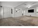 Spacious living room featuring carpet floors, and a ceiling fan at 11 Plumosa Ave, Casselberry, FL 32707