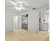 Open-concept living room featuring bright flooring, a fan, and great views at 11 Plumosa Ave, Casselberry, FL 32707