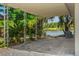 Enjoy the outdoors on this brick patio with views of the lake and lush greenery at 11 Plumosa Ave, Casselberry, FL 32707