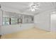 Bright sunroom with large windows offering plenty of natural light at 11 Plumosa Ave, Casselberry, FL 32707
