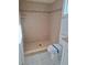 Tiled shower with matching brown accent tiles complemented by neutral flooring in renovated bathroom at 11282 Sw 62Nd Avenue Rd, Ocala, FL 34476