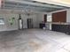 Spacious garage with work bench, appliances, and storage possibilities at 11282 Sw 62Nd Avenue Rd, Ocala, FL 34476