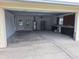 Large, unfinished two-car garage with workbench and ample space at 11282 Sw 62Nd Avenue Rd, Ocala, FL 34476