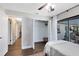 Bright bedroom with view to the backyard, wood look floors and walk in closet at 1172 Trotwood Blvd, Winter Springs, FL 32708