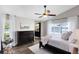 Bedroom with king bed, ceiling fan, and large windows with natural light at 1172 Trotwood Blvd, Winter Springs, FL 32708