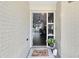 View from inside the front door showcasing the open floorplan and natural light at 1172 Trotwood Blvd, Winter Springs, FL 32708