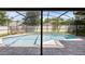 Enclosed pool area featuring a large pool and plenty of room for relaxing and entertaining at 1172 Trotwood Blvd, Winter Springs, FL 32708