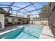 Screened pool and patio area, perfect for outdoor living and entertaining at 1172 Trotwood Blvd, Winter Springs, FL 32708
