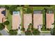 Aerial view of home with tile roof and lush landscaping at 12185 Obelia Ln, Orlando, FL 32827